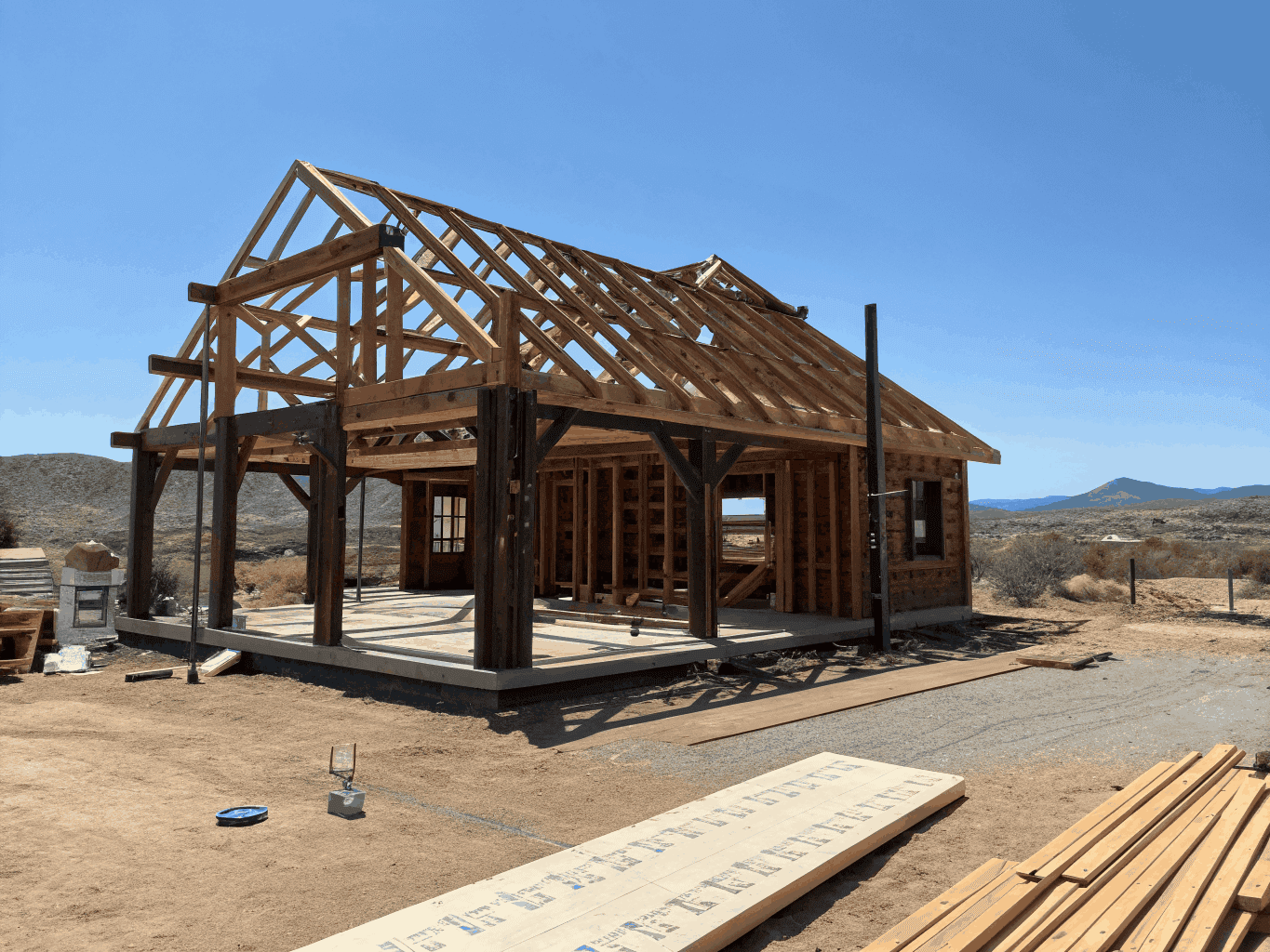 Custom home architectural framing jobsite in North Alabama