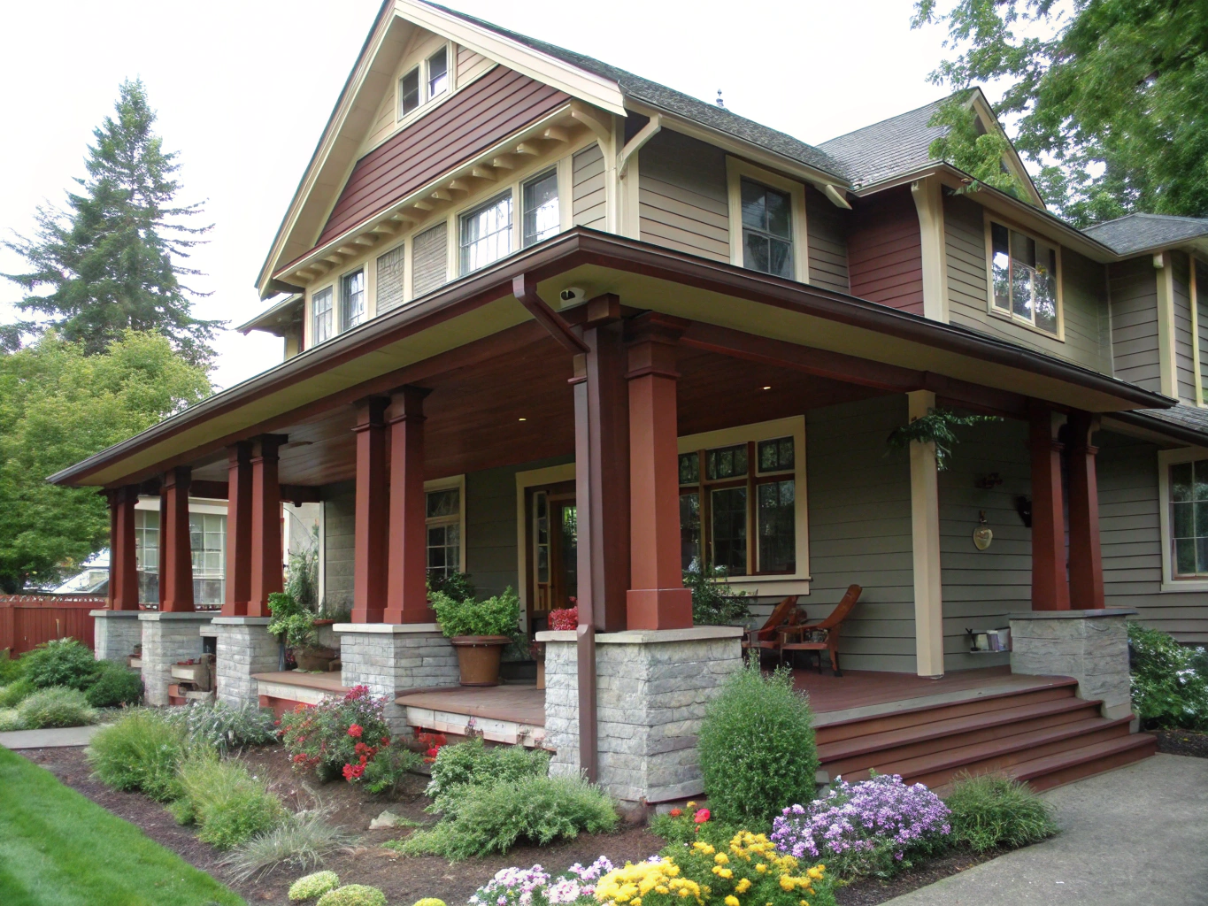 Exterior view of two-story custom craftsman home built with stone and timber accents in Decatur Alabama