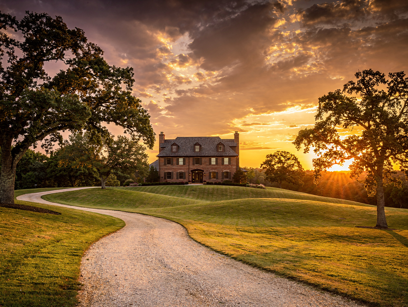 Rustic custom stone and wood estate on a gentle hillside in Morgan County Alabama